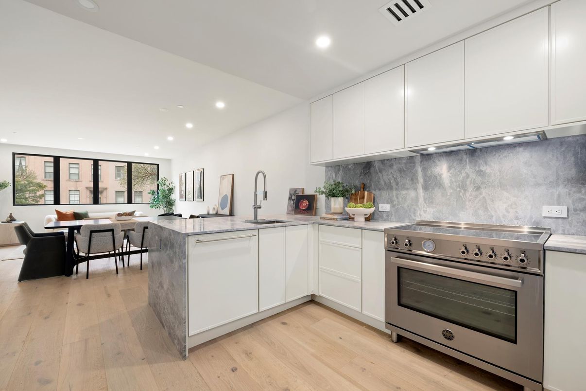Dining room, Interior, Kitchen, Living room, Recessed Lighting, Stainless Steel Appliances, Wood Texture Flooring