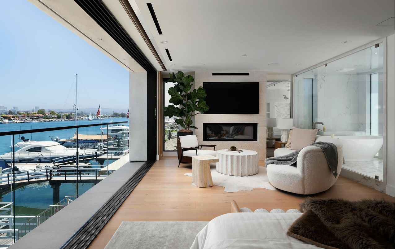 Fireplace, Interior, Living room, Recessed Lighting, Water, Wood Texture Flooring