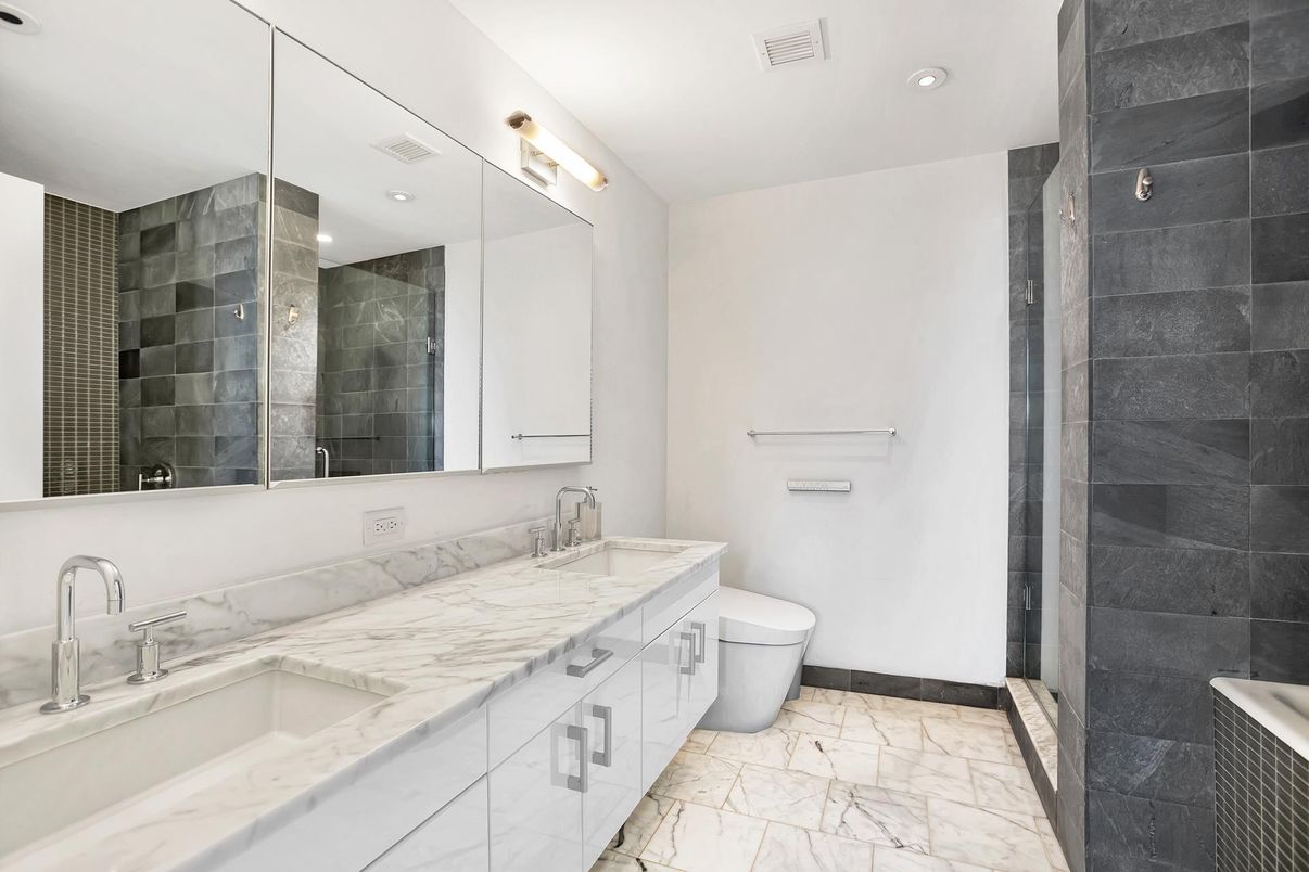 Bathroom, Dual Sink Vanities, Glass Shower, Interior, Marble, Recessed Lighting