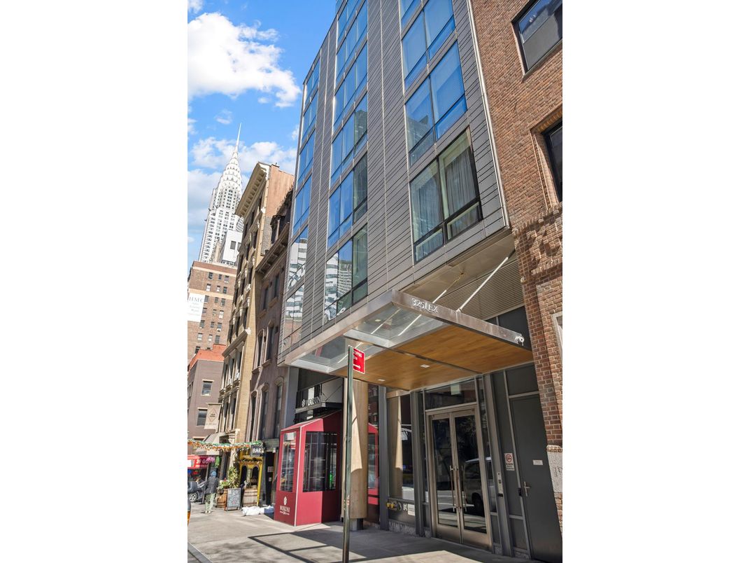 Exterior, Facade, Brick Facade, Condo Building