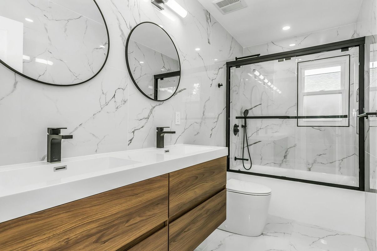 Bathroom, Dual Sink Vanities, Glass Shower, Interior, Marble, Marble Walls, Recessed Lighting
