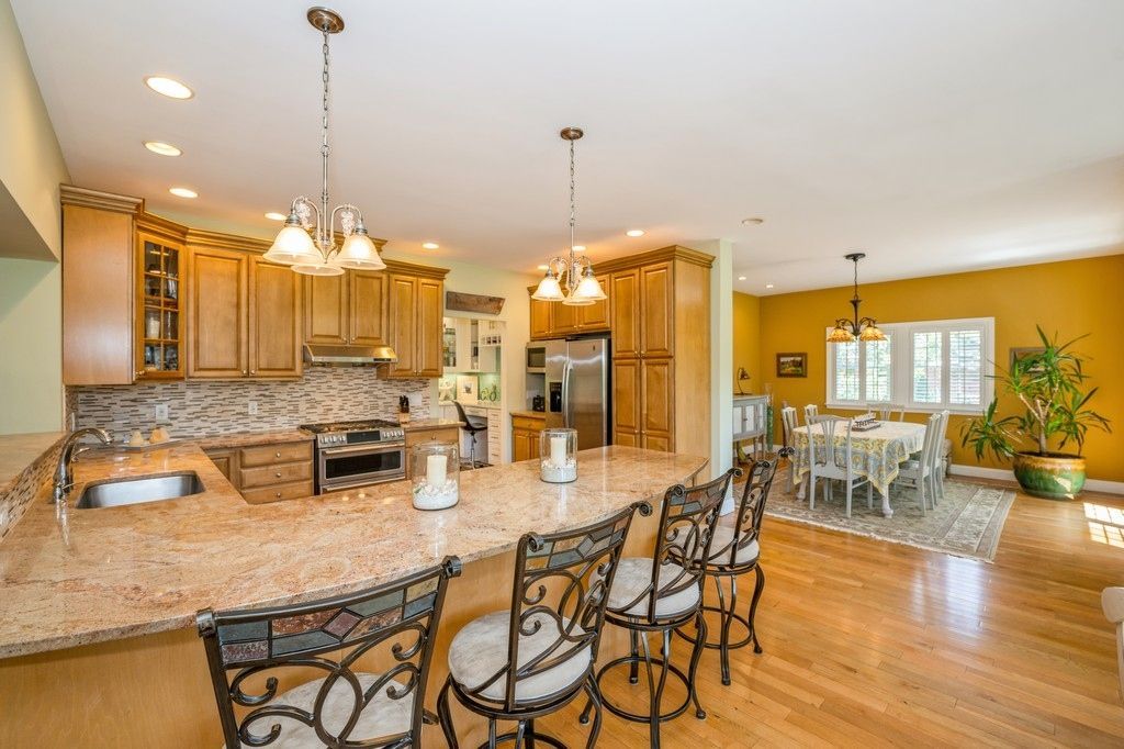 Chandelier, Dining room, Interior, Kitchen, Pendant Lights, Recessed Lighting, Stainless Steel Appliances, Wood Texture Flooring