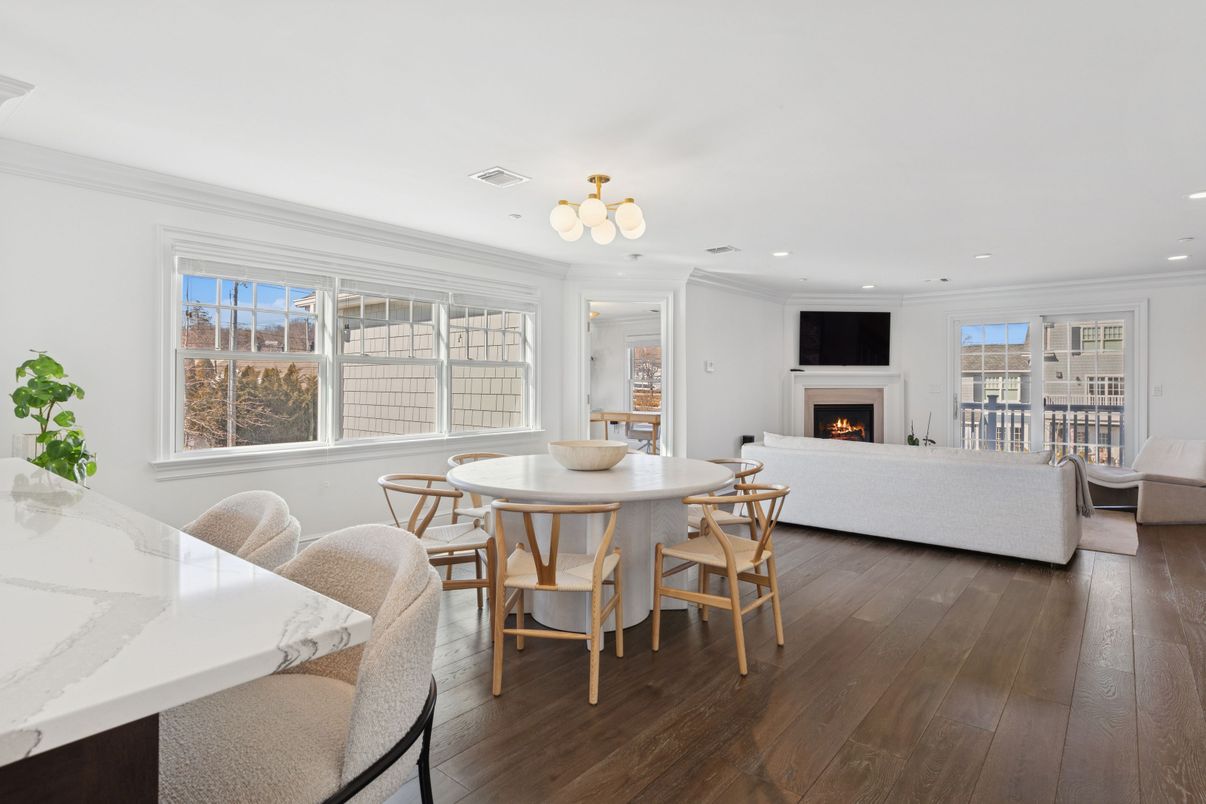 Dining room, Fireplace, Interior, Living room, Recessed Lighting, Wood Texture Flooring
