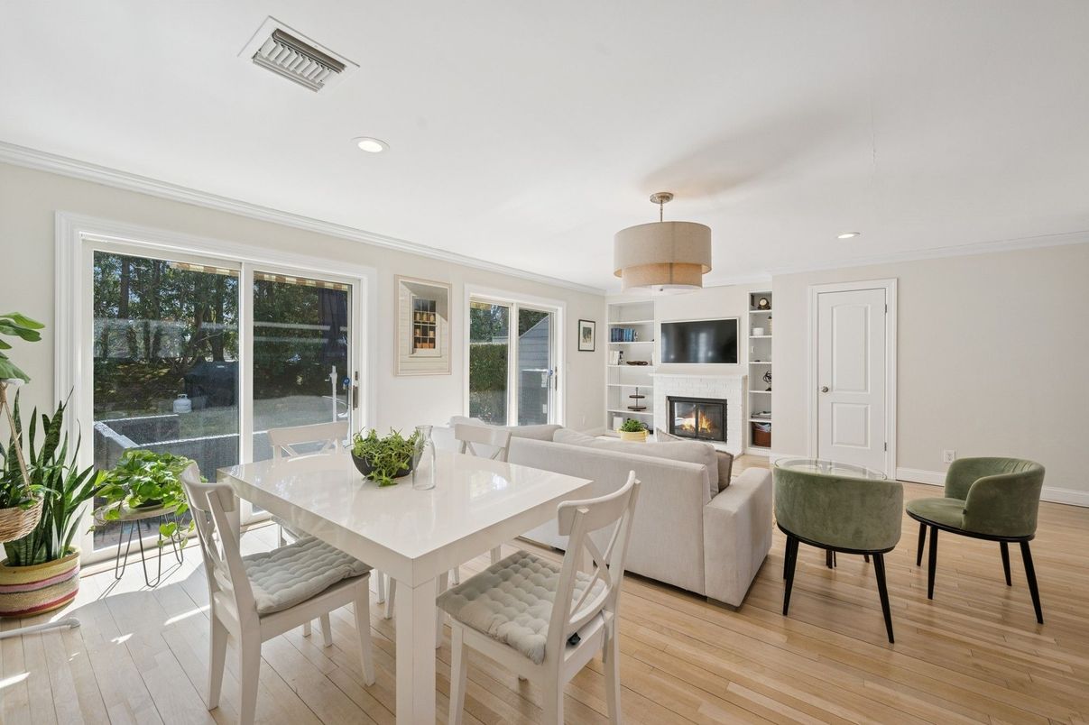 Dining room, Fireplace, Interior, Living room, Pendant Lights, Recessed Lighting, Wood Texture Flooring