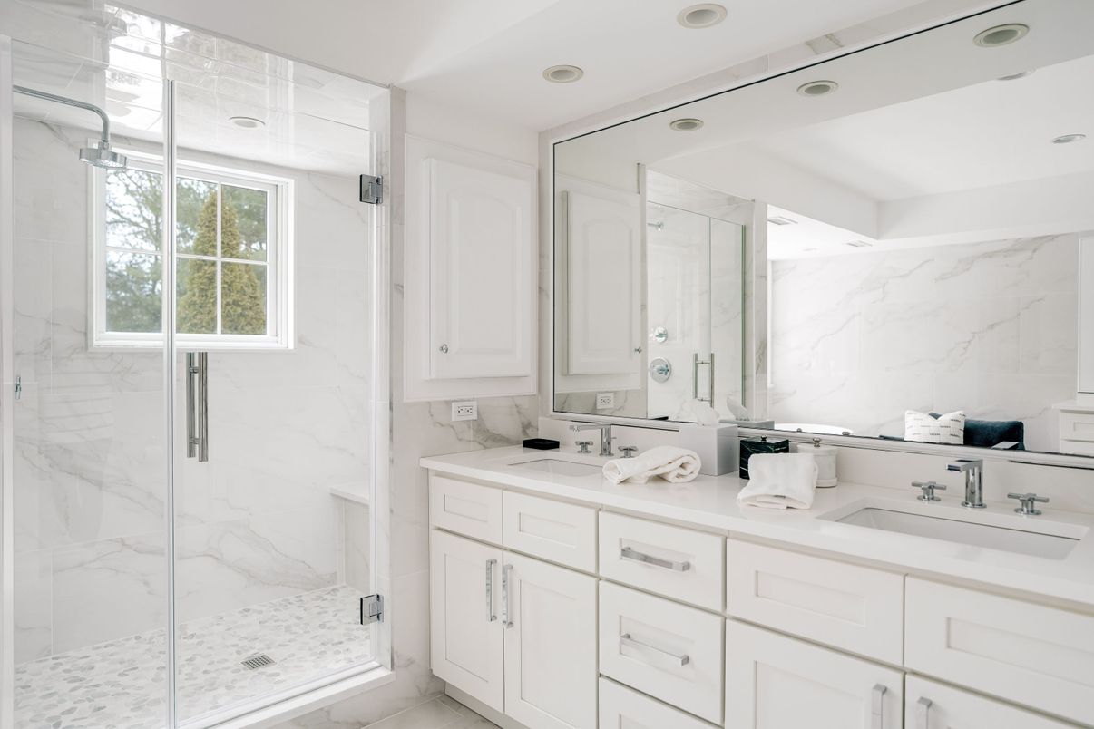 Bathroom, Dual Sink Vanities, Glass Shower, Interior, Marble, Marble Walls, Recessed Lighting