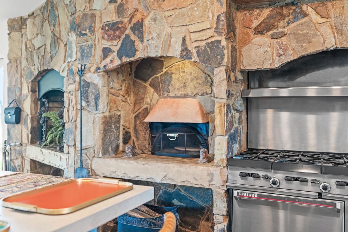 Fireplace, Interior, Kitchen, Stainless Steel Appliances, Stone Walls