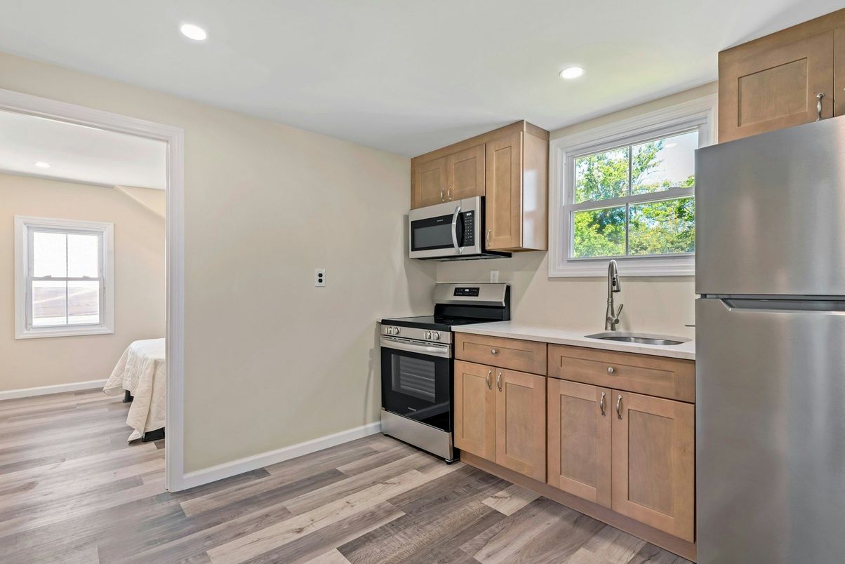 Interior, Kitchen, Recessed Lighting, Stainless Steel Appliances, Wood Texture Flooring