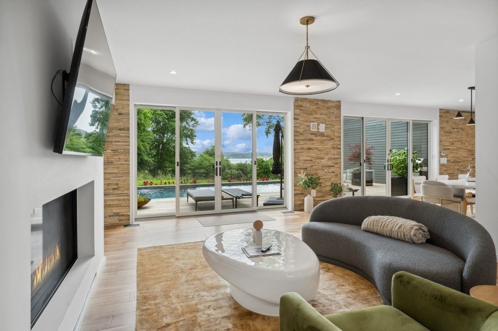 Fireplace, Interior, Living room, Pendant Lights, Recessed Lighting, Stone Walls, Wood Texture Flooring