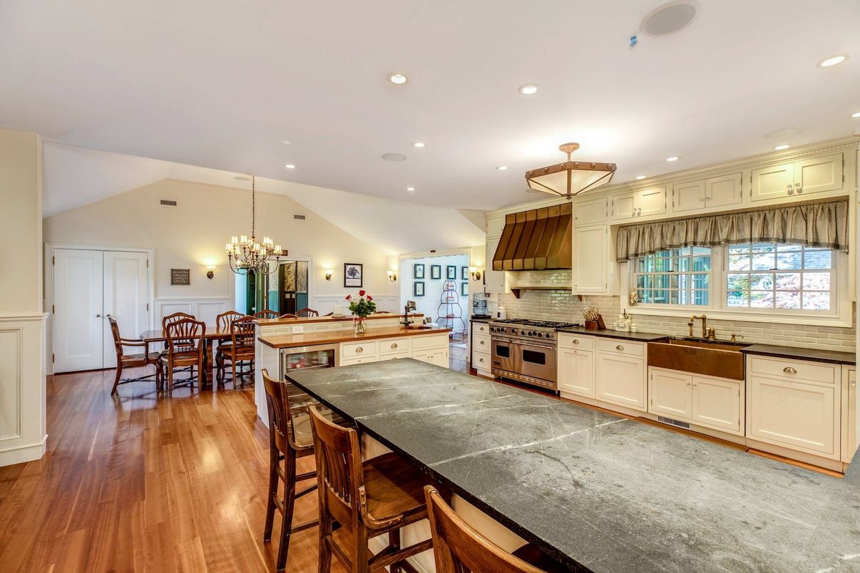 Chandelier, Dining room, Interior, Kitchen, Recessed Lighting, Stainless Steel Appliances, Wood Texture Flooring