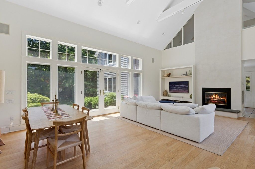Dining room, Fireplace, Interior, Living room, Recessed Lighting, Wood Texture Flooring