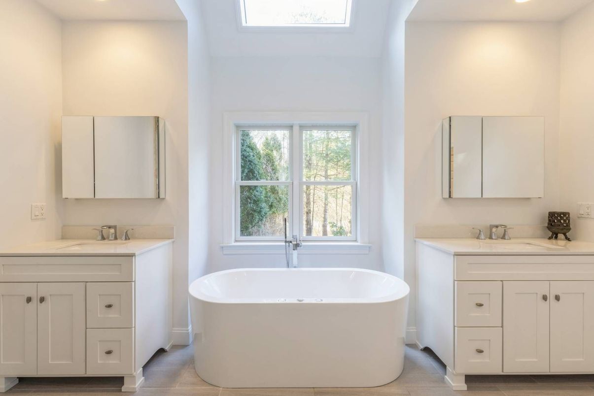 Bathroom, Dual Sink Vanities, Free Standing Baths, Interior, Recessed Lighting, Wood Texture Flooring