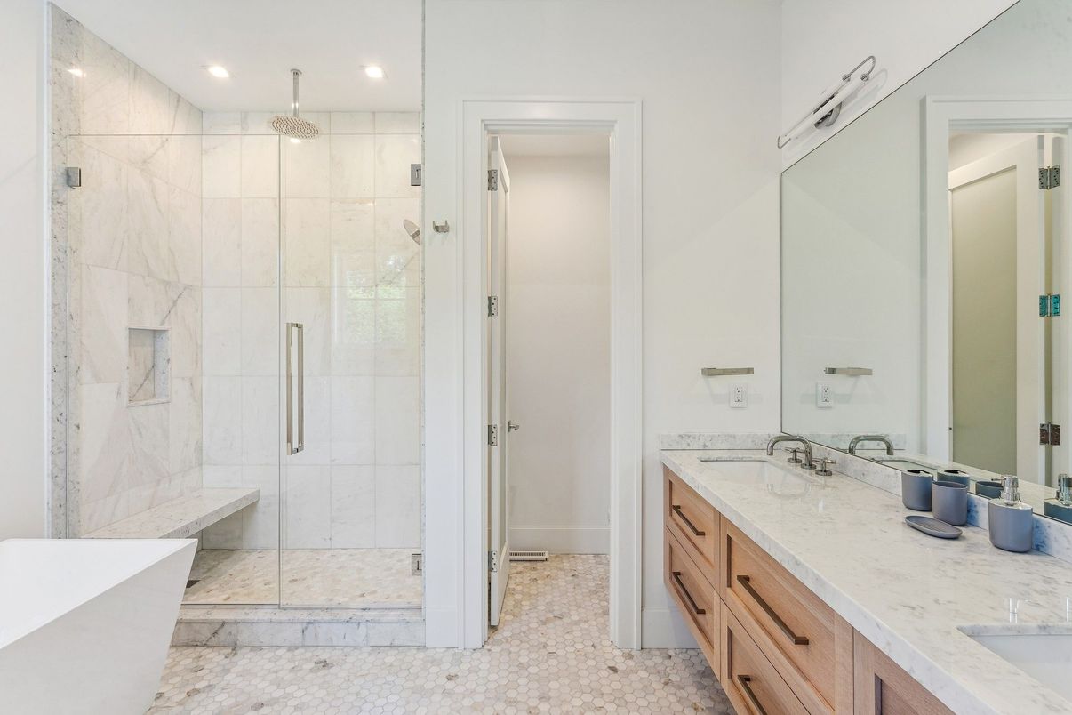 Bathroom, Dual Sink Vanities, Glass Shower, Interior, Marble, Marble Walls, Recessed Lighting