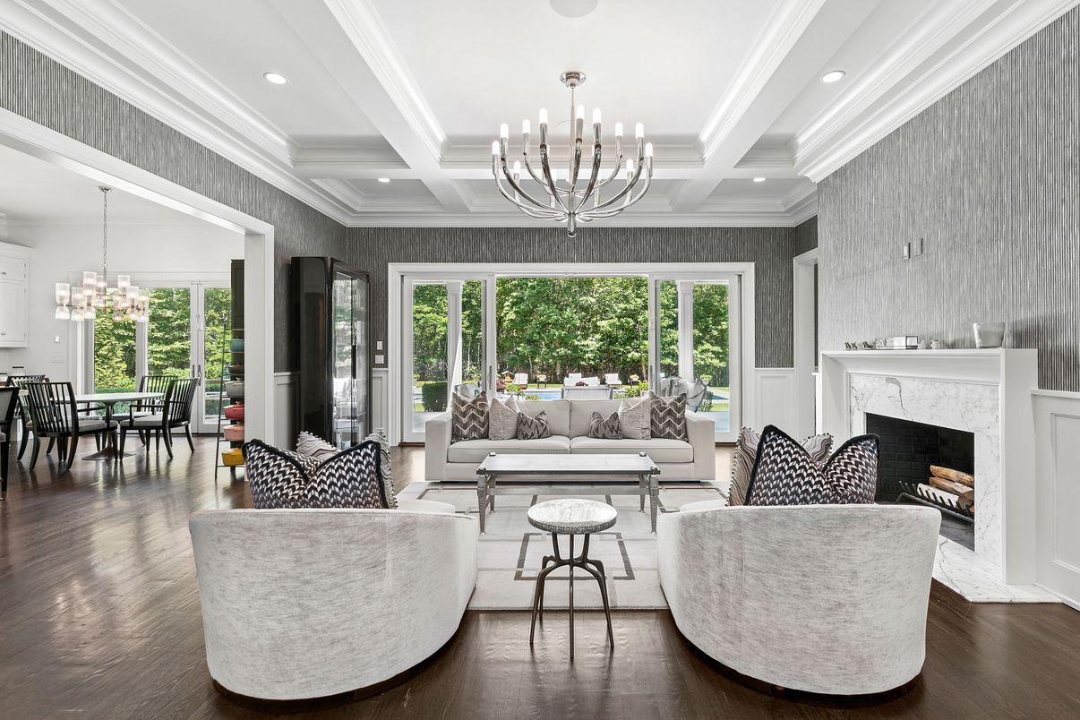 Chandelier, Dining room, Fireplace, Interior, Living room, Recessed Lighting, Wood Texture Flooring
