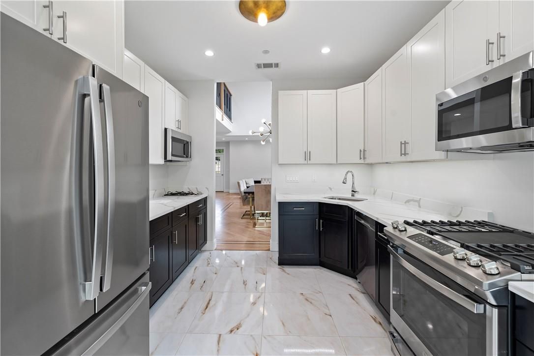Dining room, Interior, Kitchen, Living room, Marble, Recessed Lighting, Stainless Steel Appliances