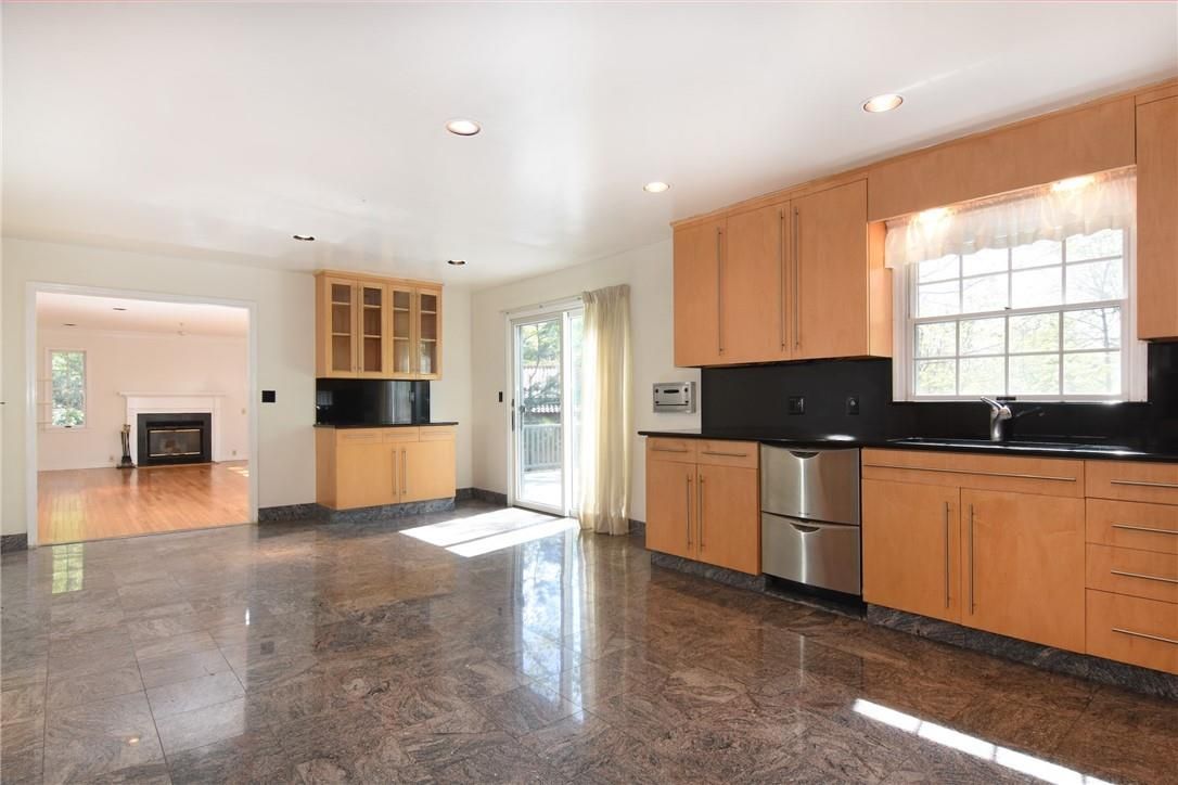 Fireplace, Interior, Kitchen, Recessed Lighting, Stainless Steel Appliances, Wood Texture Flooring