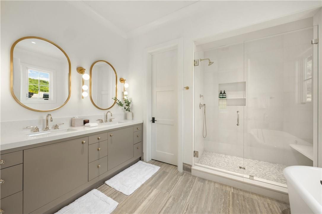 Bathroom, Dual Sink Vanities, Glass Shower, Interior, Wood Texture Flooring
