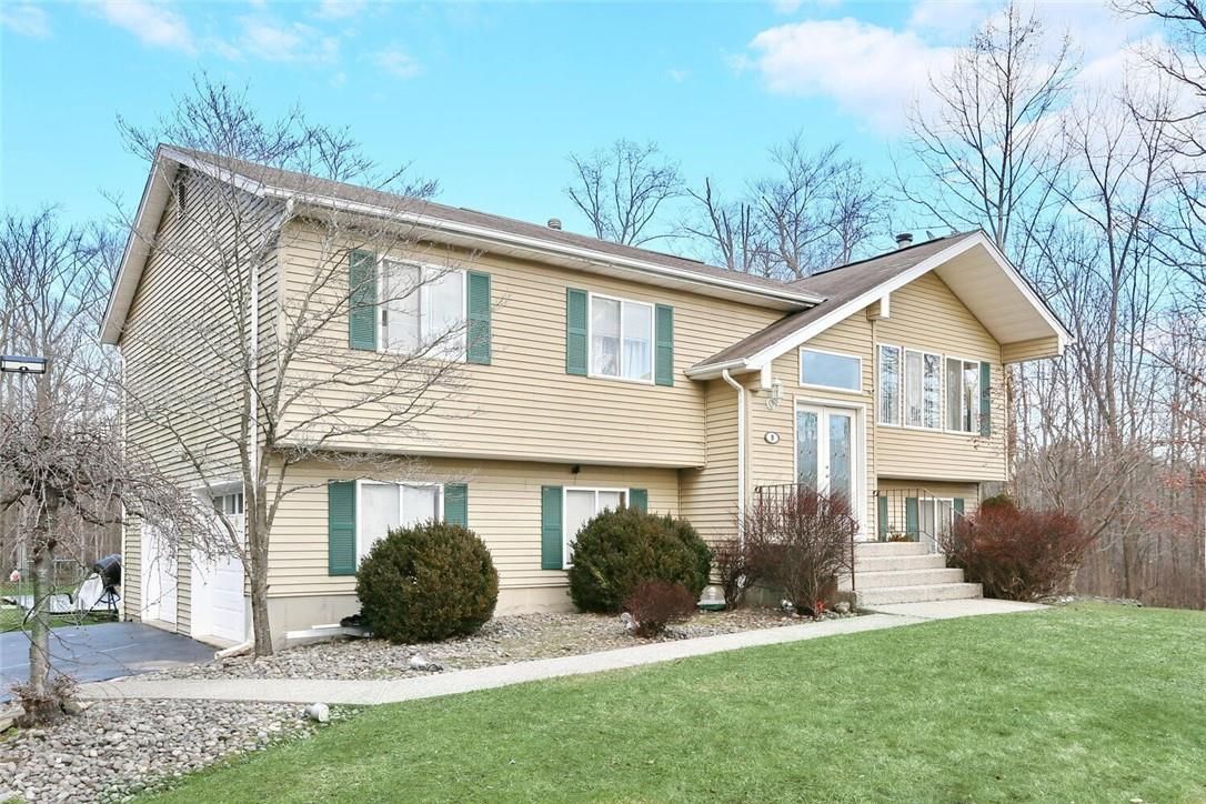 Attached, Exterior, Facade, Raised Ranch