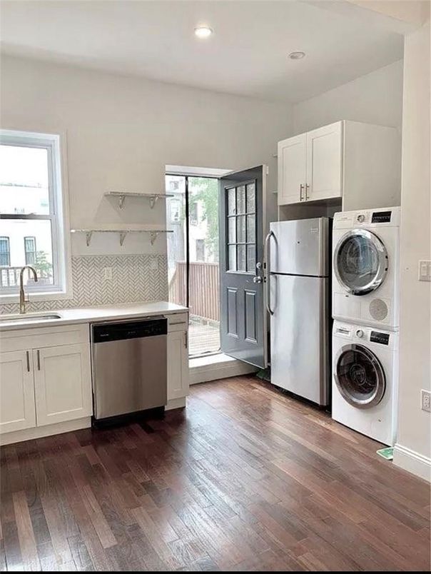 Interior, Kitchen, Recessed Lighting, Washer, Wood Texture Flooring