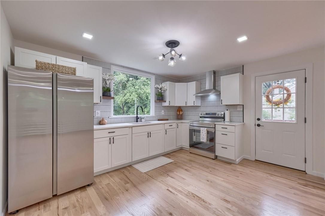 Interior, Kitchen, Recessed Lighting, Stainless Steel Appliances, Wood Texture Flooring