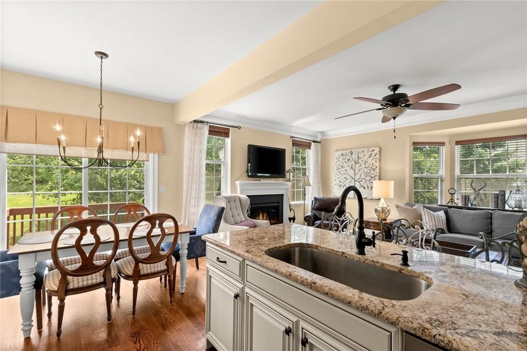 Dining room, Fireplace, Interior, Living room, Pendant Lights, Wood Texture Flooring