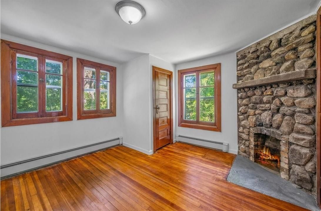 Empty room, Fireplace, Interior, Stone Walls, Wood Texture Flooring