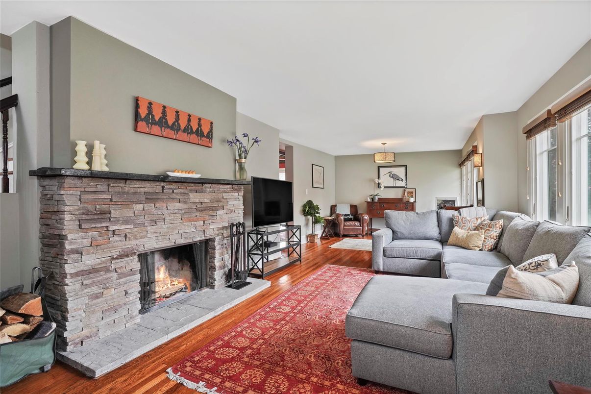Dining room, Fireplace, Interior, Living room, Pendant Lights, Stone Walls, Wood Texture Flooring
