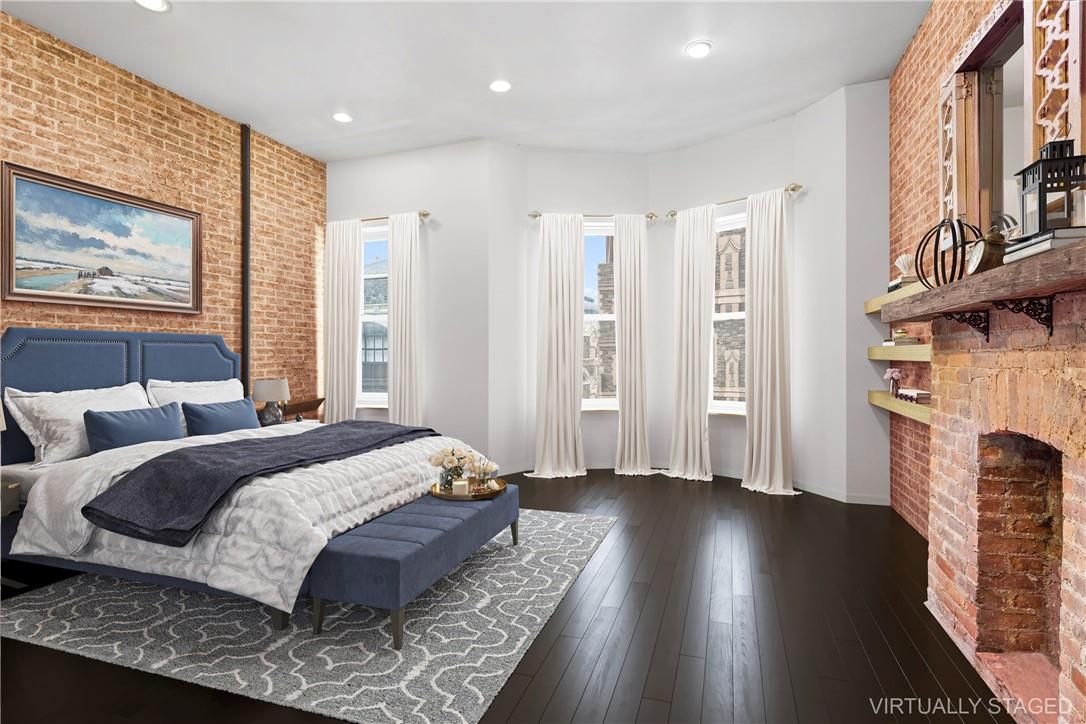 Bedroom, Fireplace, Interior, Recessed Lighting, Stone Walls, Wood Texture Flooring