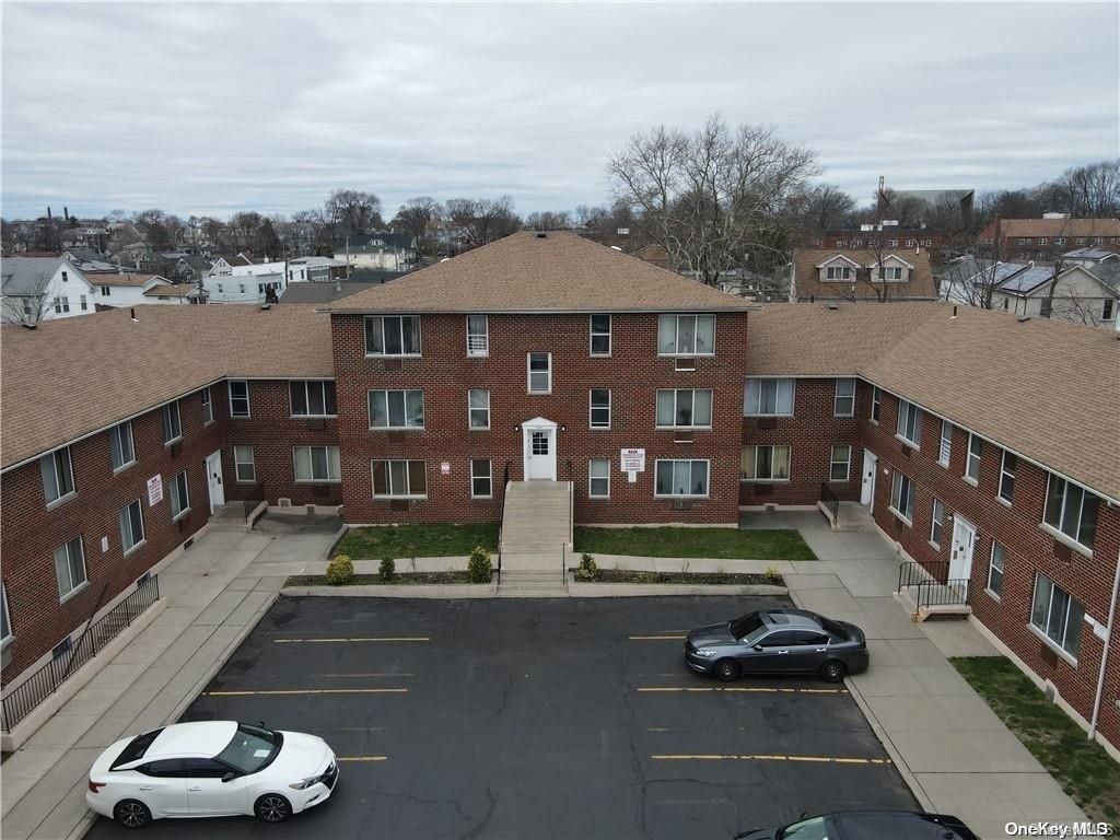 Exterior, Facade, Brick Facade, Condo Building