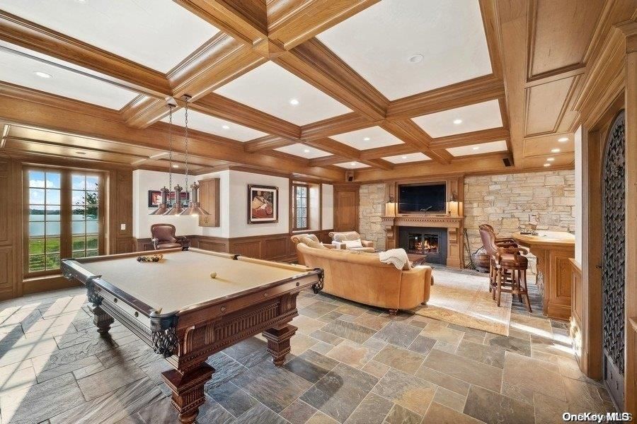 Billiard Table, Fireplace, Game Room, Interior, Living room, Pendant Lights, Recessed Lighting, Stone Walls, Wooden Beams