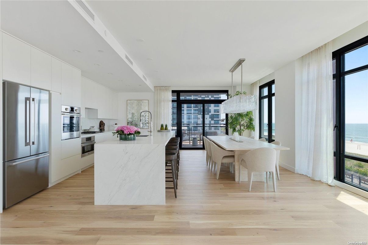 Dining room, Interior, Kitchen, Pendant Lights, Stainless Steel Appliances, Water, Wood Texture Flooring