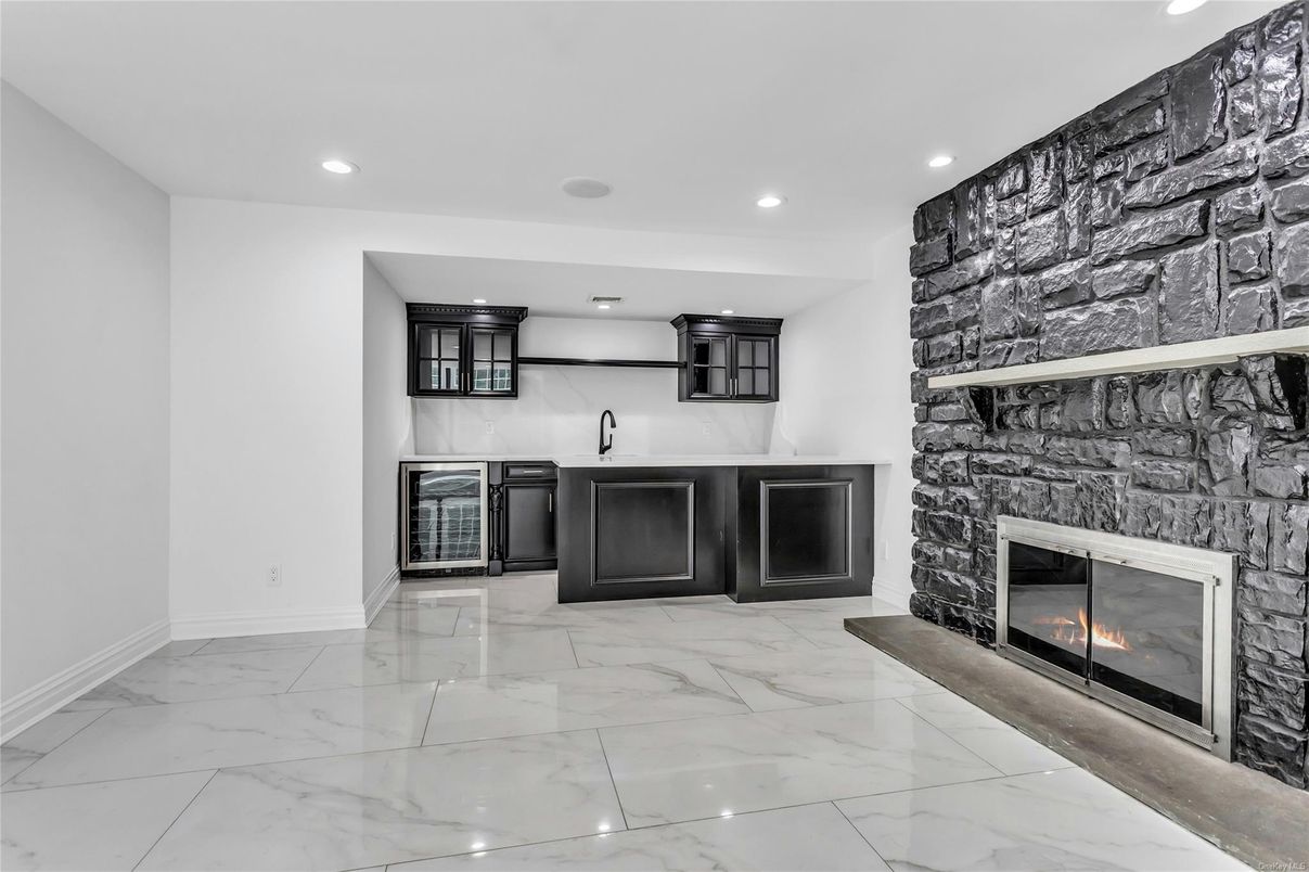 Fireplace, Interior, Kitchen, Marble, Recessed Lighting, Stone Walls
