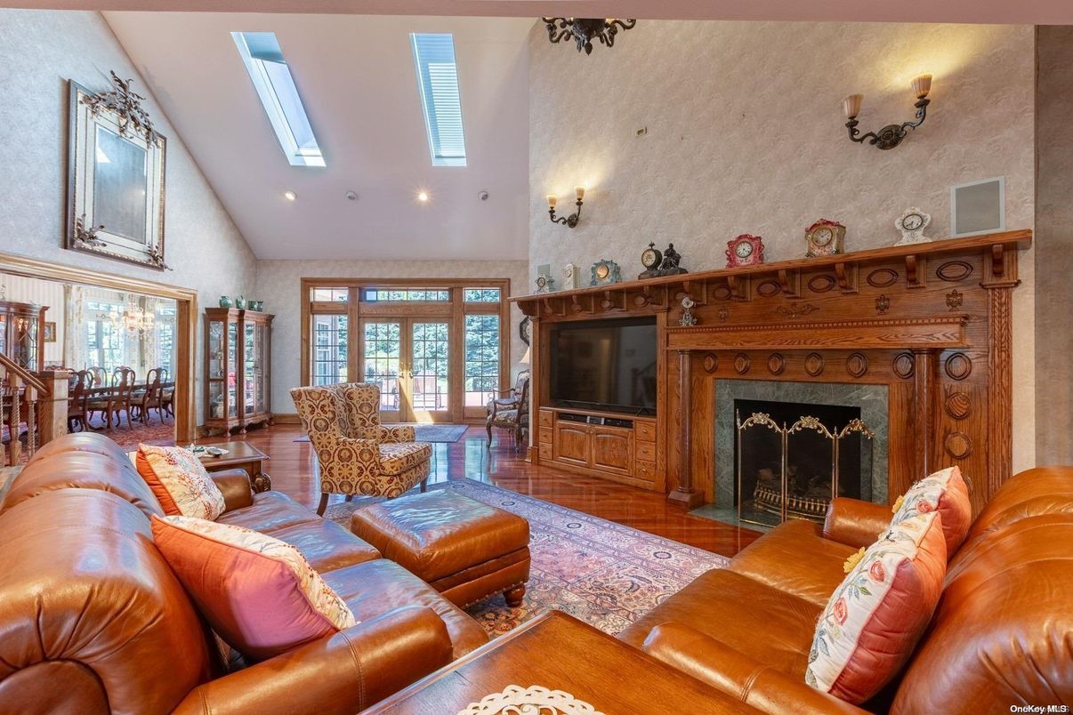 Dining room, Fireplace, Interior, Living room, Recessed Lighting, Wood Texture Flooring