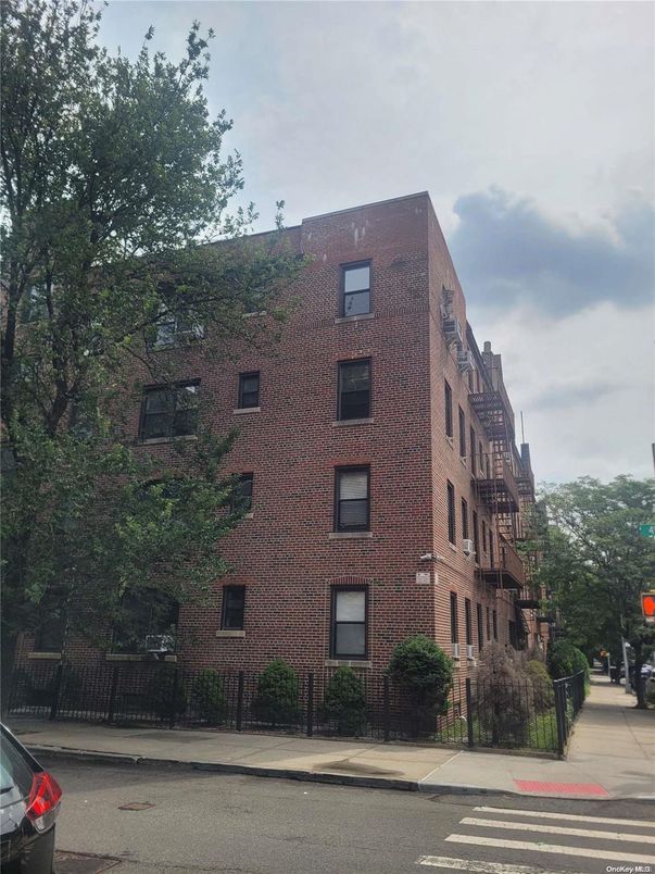Exterior, Facade, Brick Facade, Condo Building