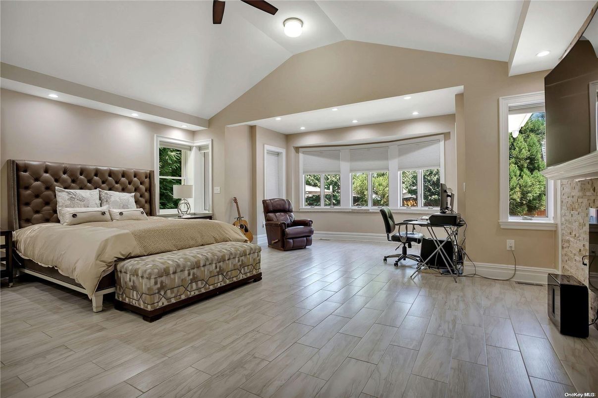Bedroom, Fireplace, Interior, Recessed Lighting, Wood Texture Flooring