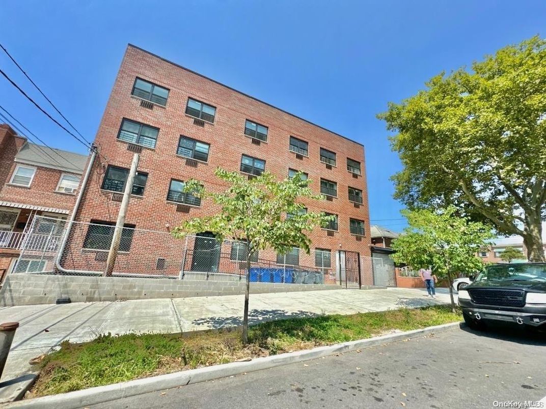Exterior, Facade, Brick Facade, Condo Building