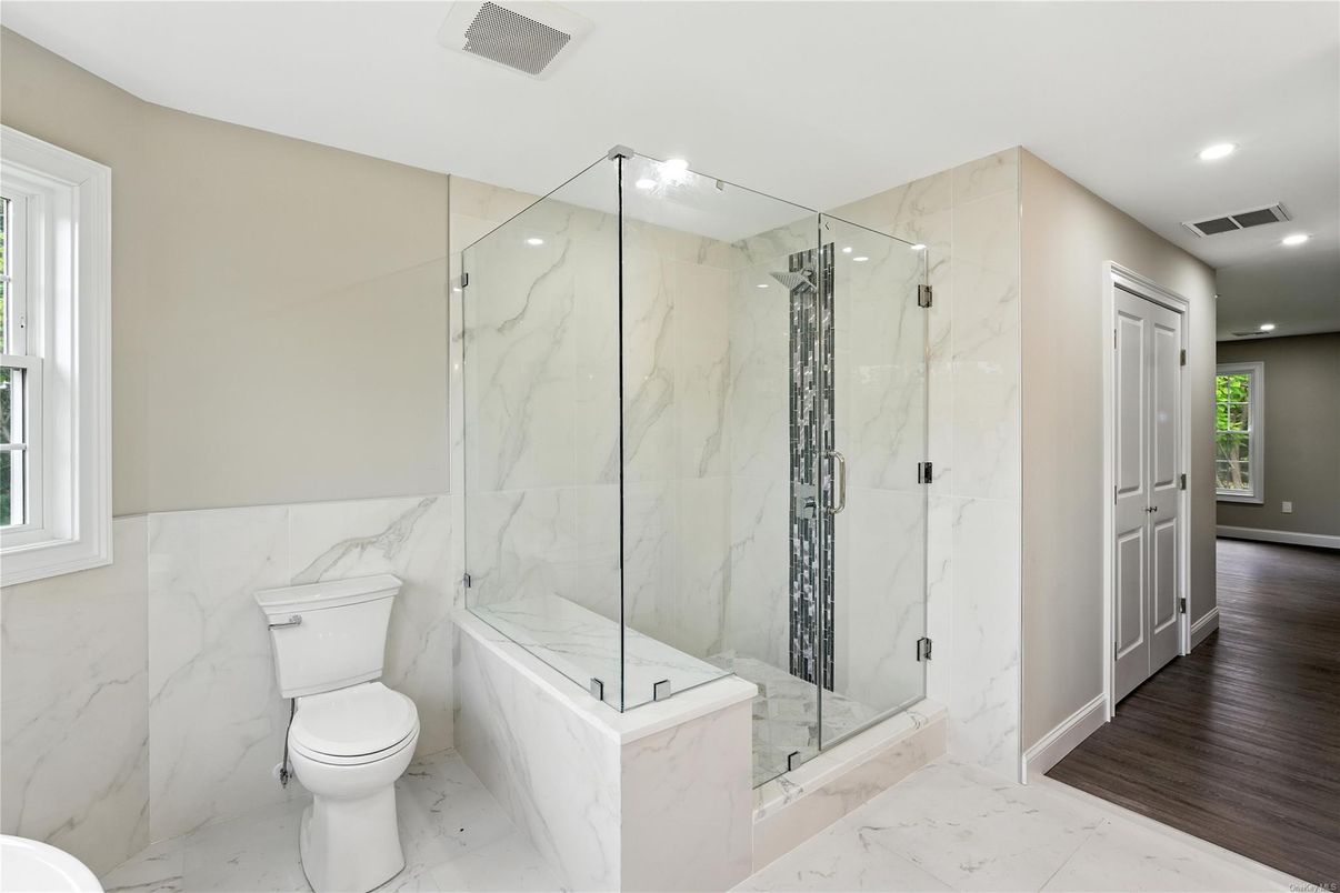 Bathroom, Glass Shower, Interior, Marble, Marble Walls, Recessed Lighting, Wood Texture Flooring
