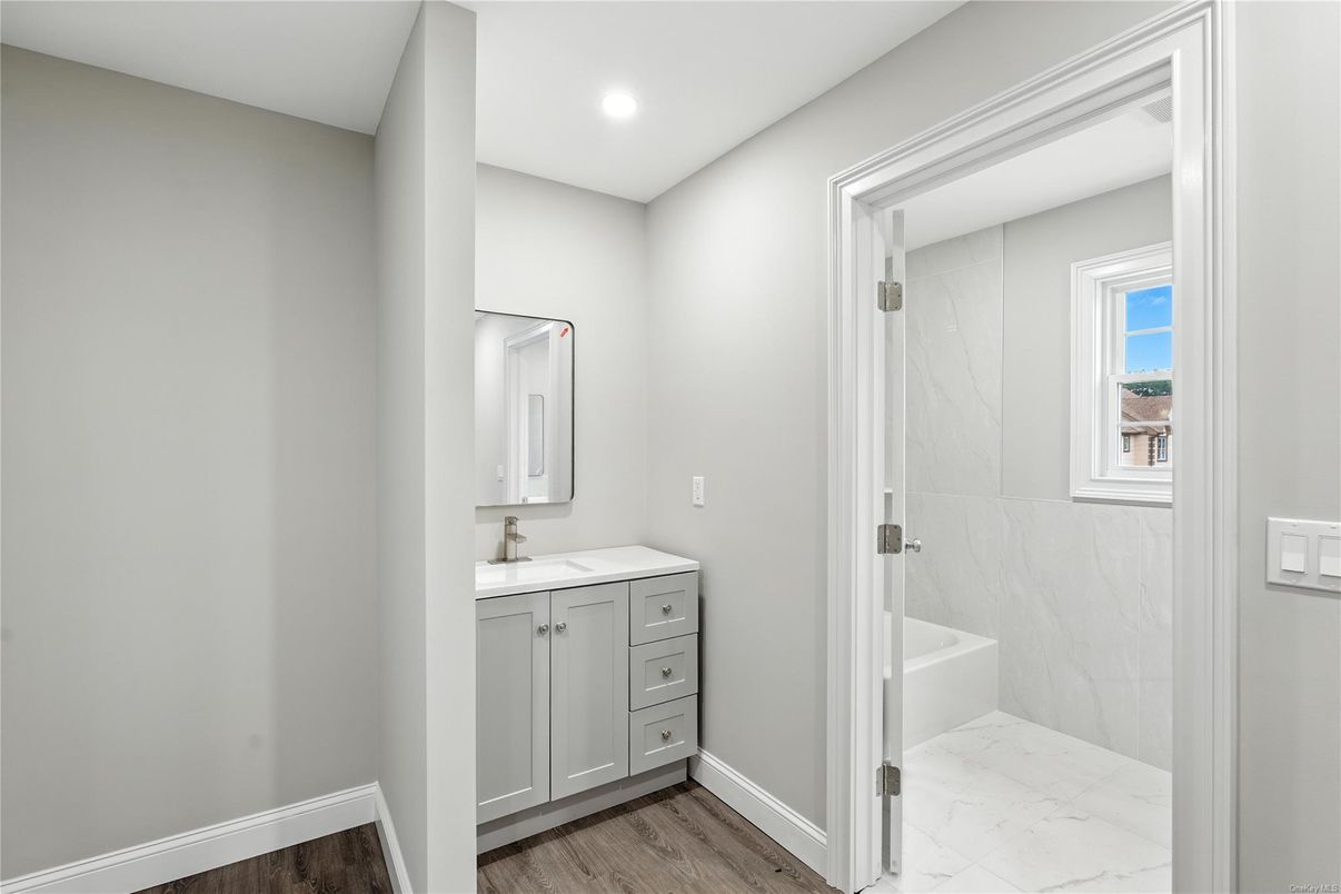 Bathroom, Interior, Marble, Marble Walls, Recessed Lighting, Wood Texture Flooring