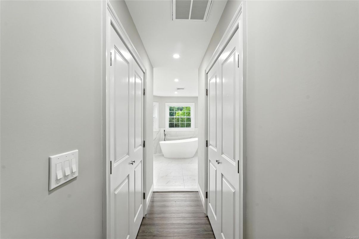 Bathroom, Free Standing Baths, Interior, Marble, Recessed Lighting, Wood Texture Flooring