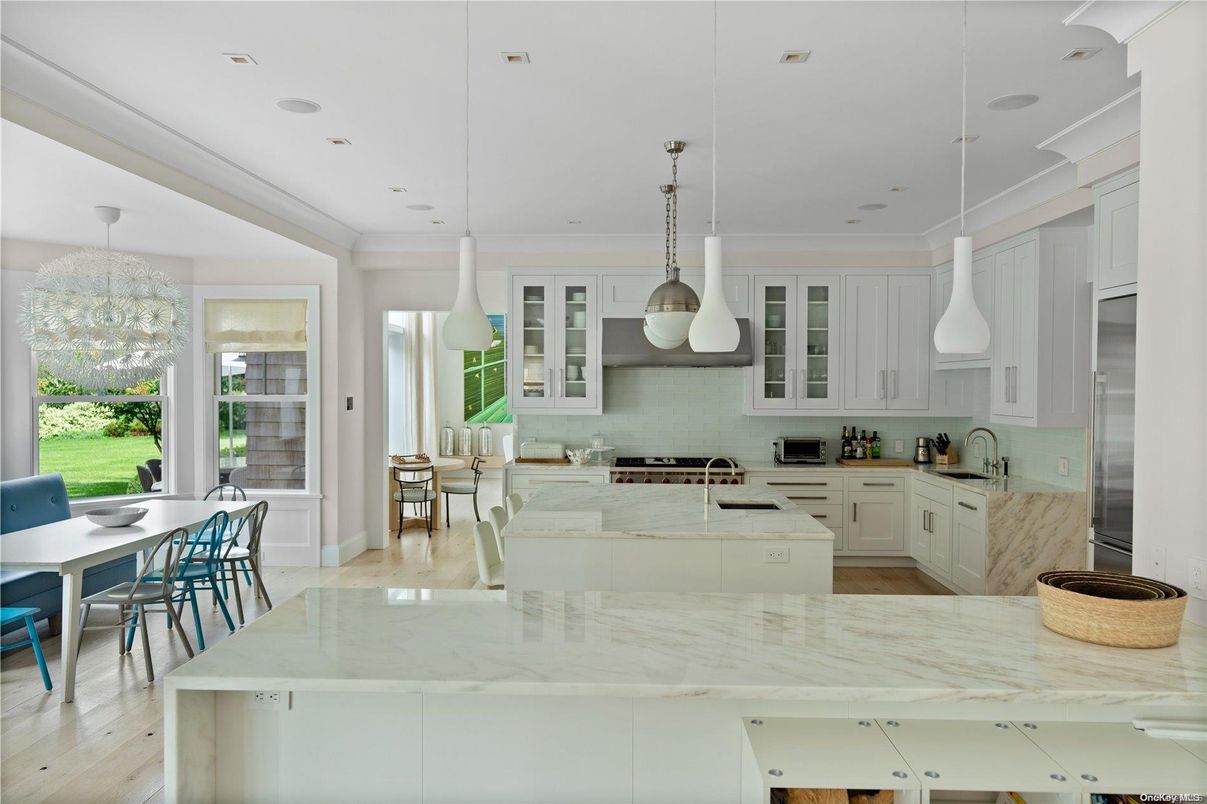 Dining room, Interior, Kitchen, Pendant Lights, Recessed Lighting, Stainless Steel Appliances, Wood Texture Flooring