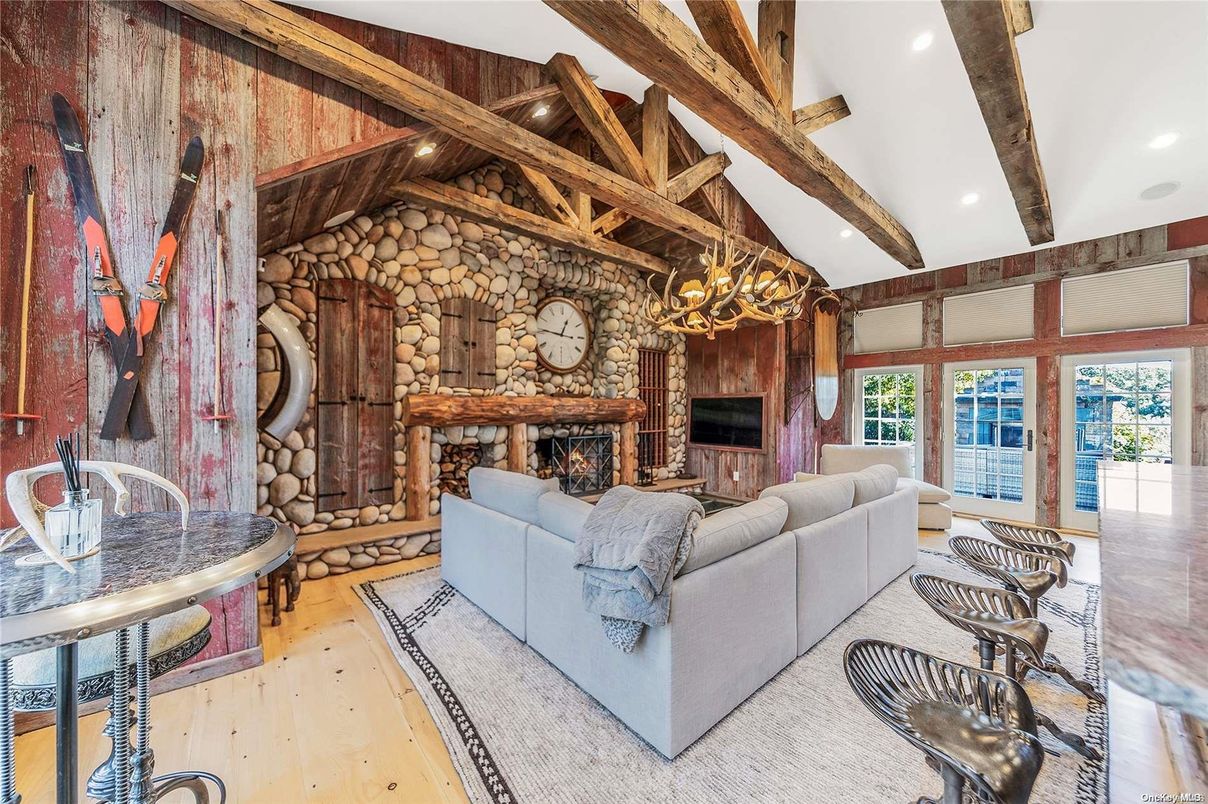 Fireplace, Interior, Living room, Recessed Lighting, Stone Walls, Wooden Beams, Wood Texture Flooring