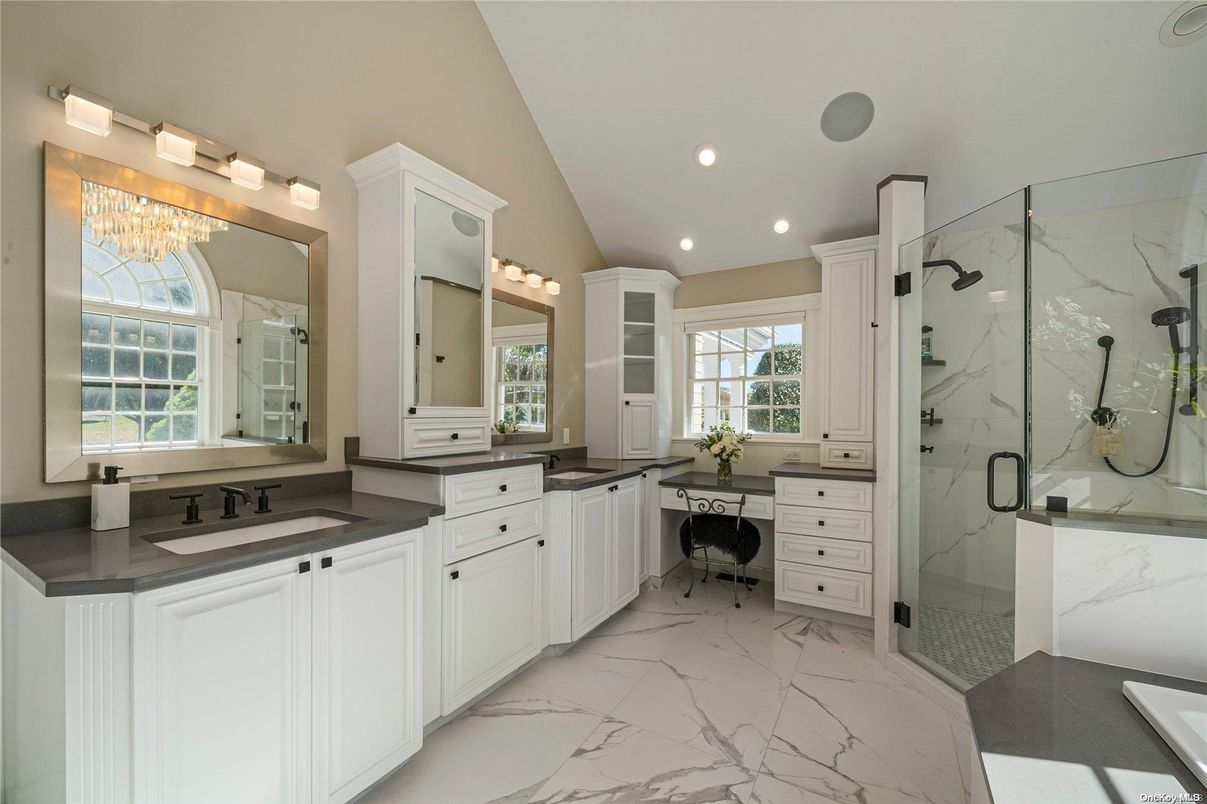 Bathroom, Dual Sink Vanities, Glass Shower, Interior, Marble, Marble Walls, Recessed Lighting