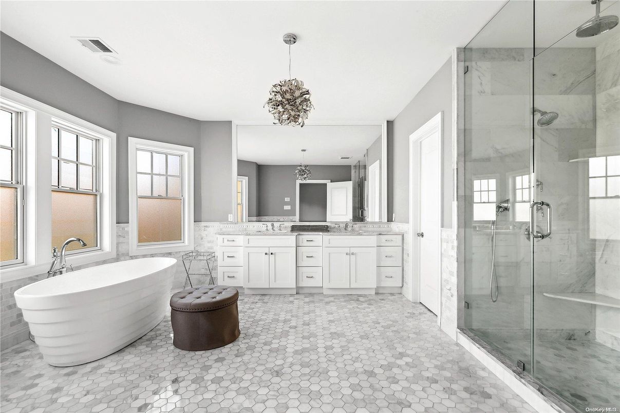 Bathroom, Chandelier, Dual Sink Vanities, Free Standing Baths, Glass Shower, Interior, Marble Walls, Pendant Lights
