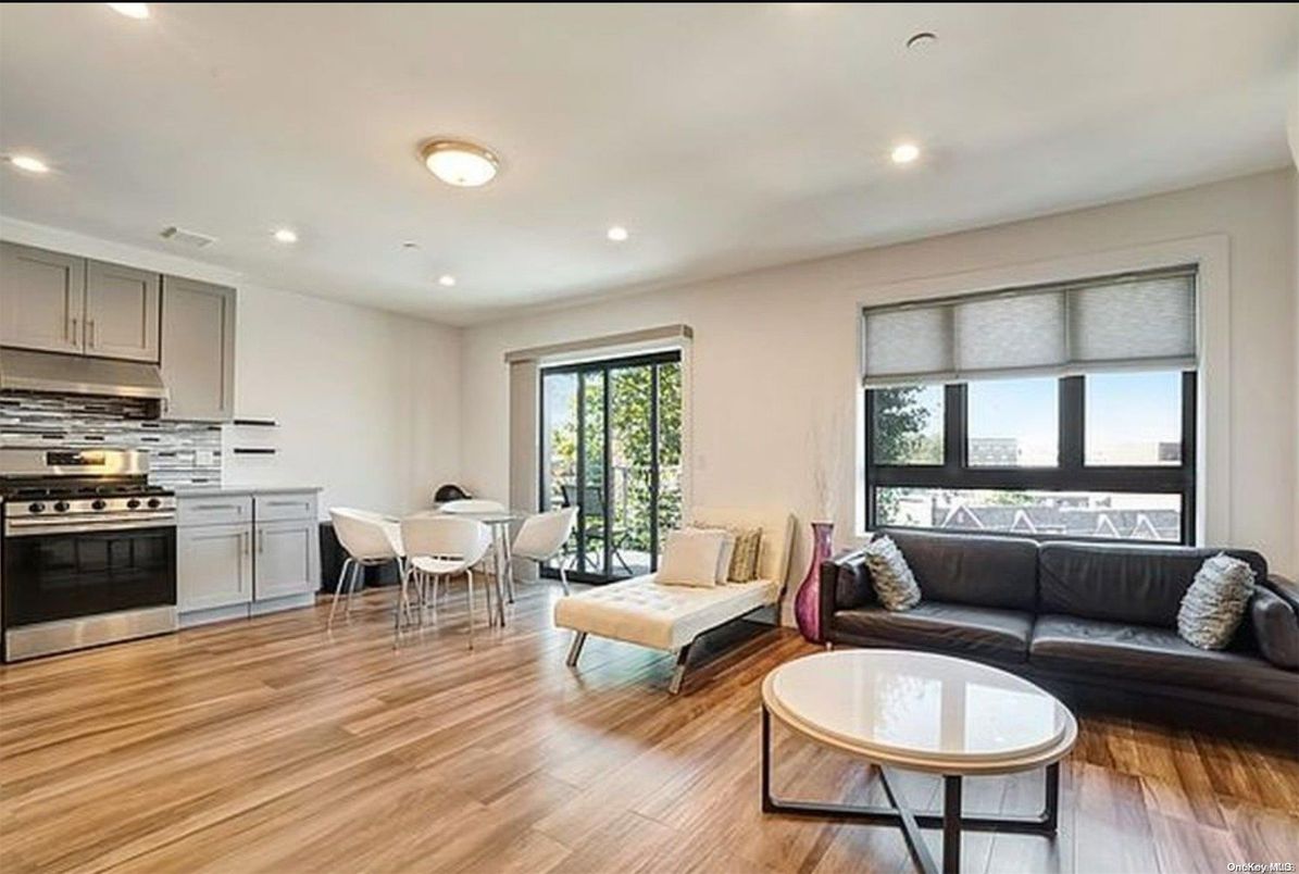 Dining room, Interior, Kitchen, Living room, Recessed Lighting, Stainless Steel Appliances, Wood Texture Flooring