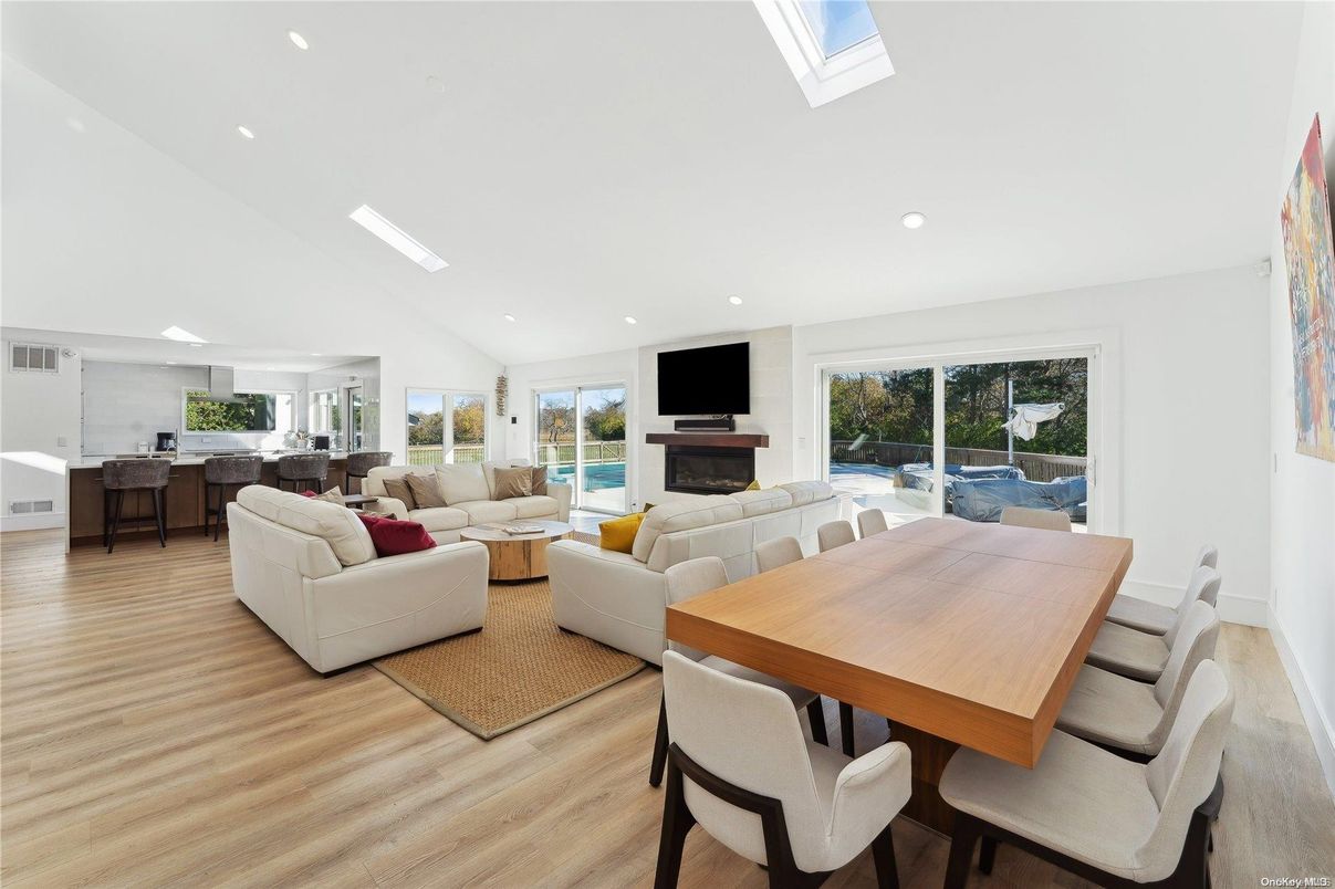 Dining room, Fireplace, Interior, Kitchen, Living room, Recessed Lighting, Wood Texture Flooring