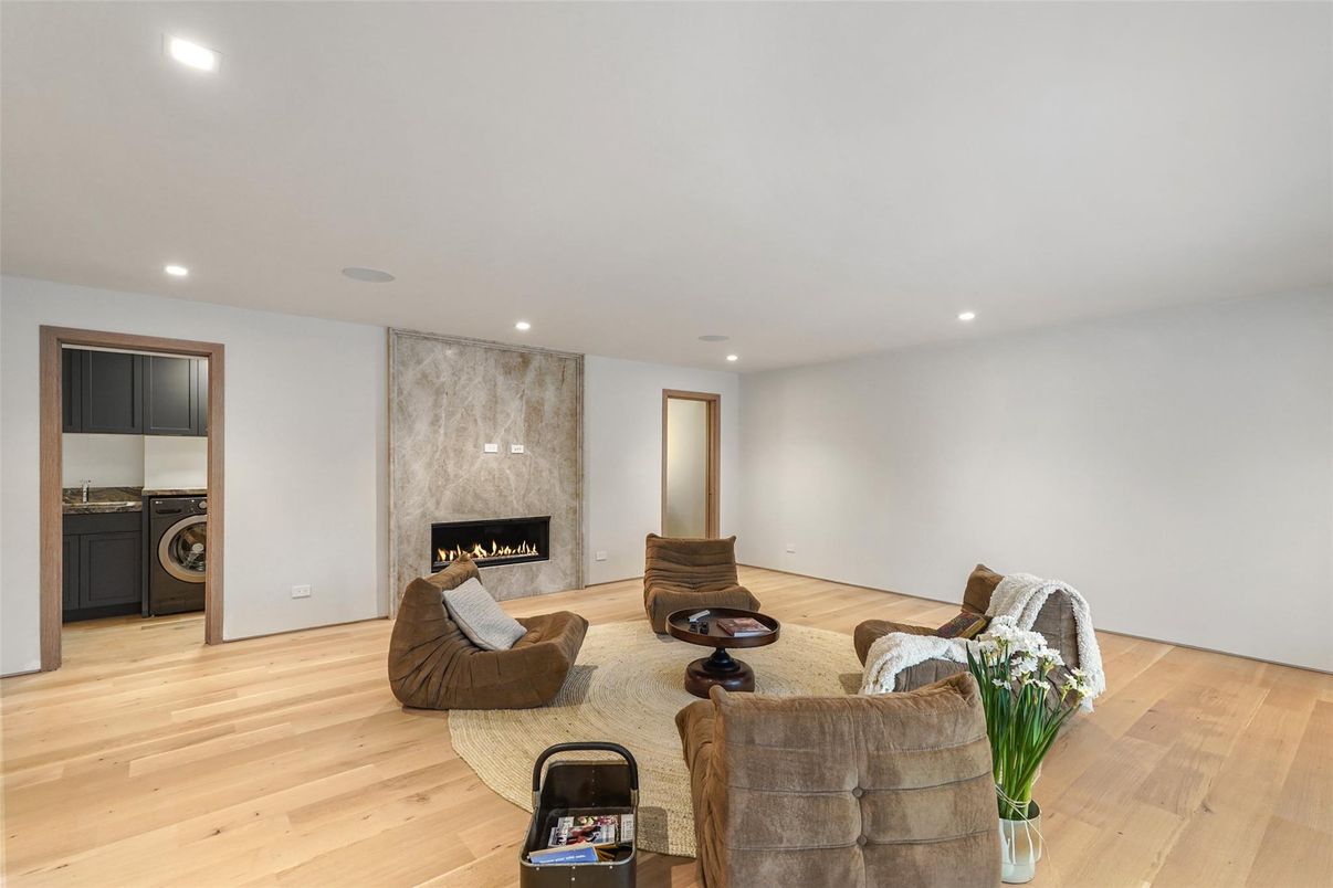 Fireplace, Interior, Living room, Recessed Lighting, Washer, Wood Texture Flooring