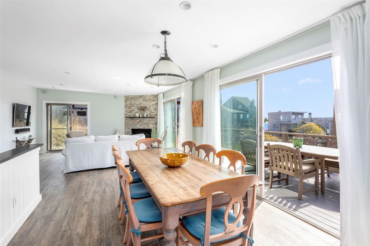 Dining room, Fireplace, Interior, Living room, Pendant Lights, Recessed Lighting, Stone Walls, Wood Texture Flooring