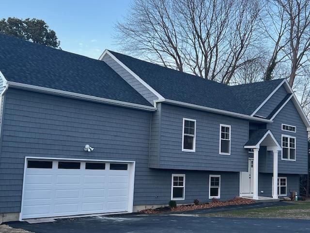Attached, Exterior, Facade, Raised Ranch
