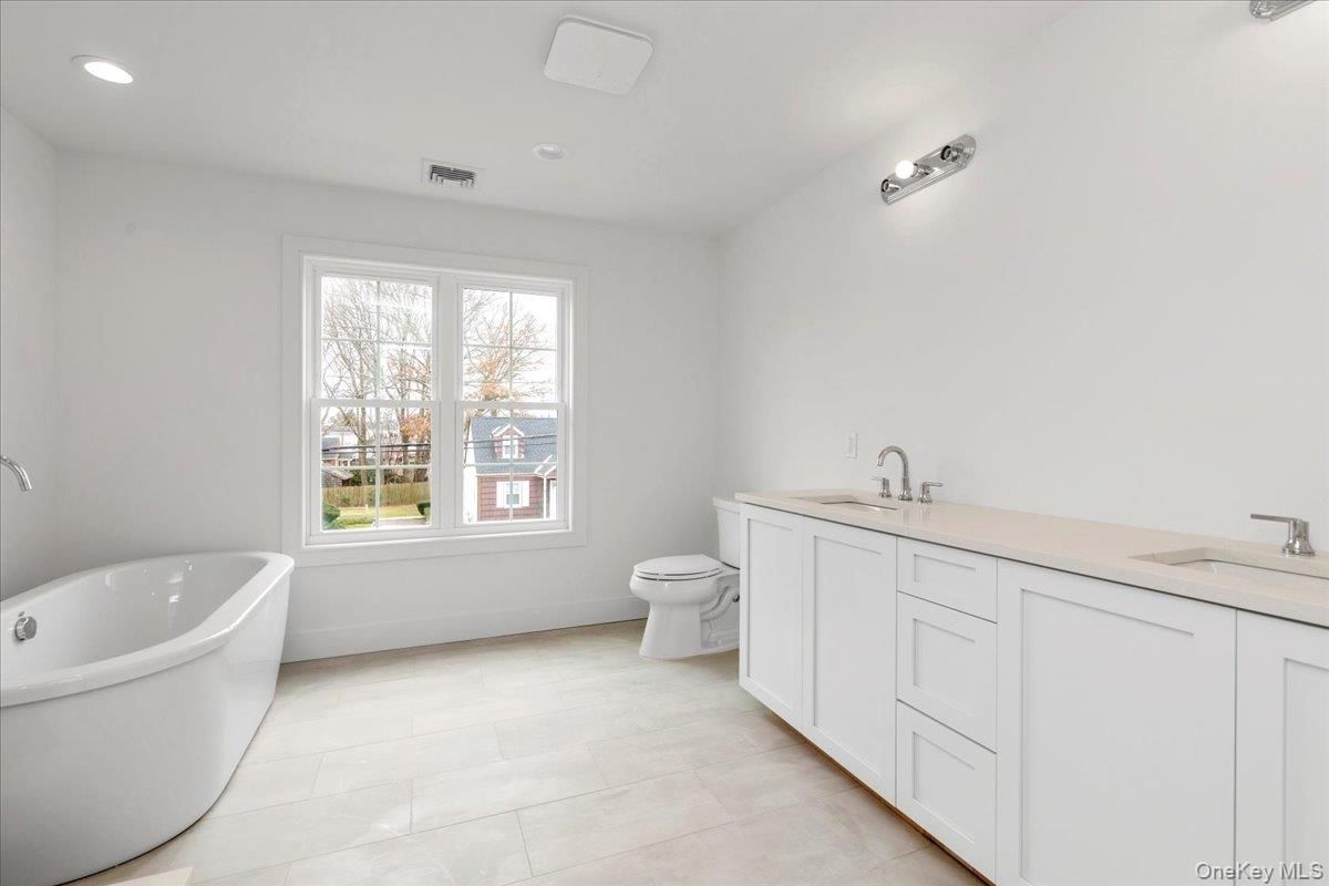 Bathroom, Dual Sink Vanities, Free Standing Baths, Interior, Recessed Lighting