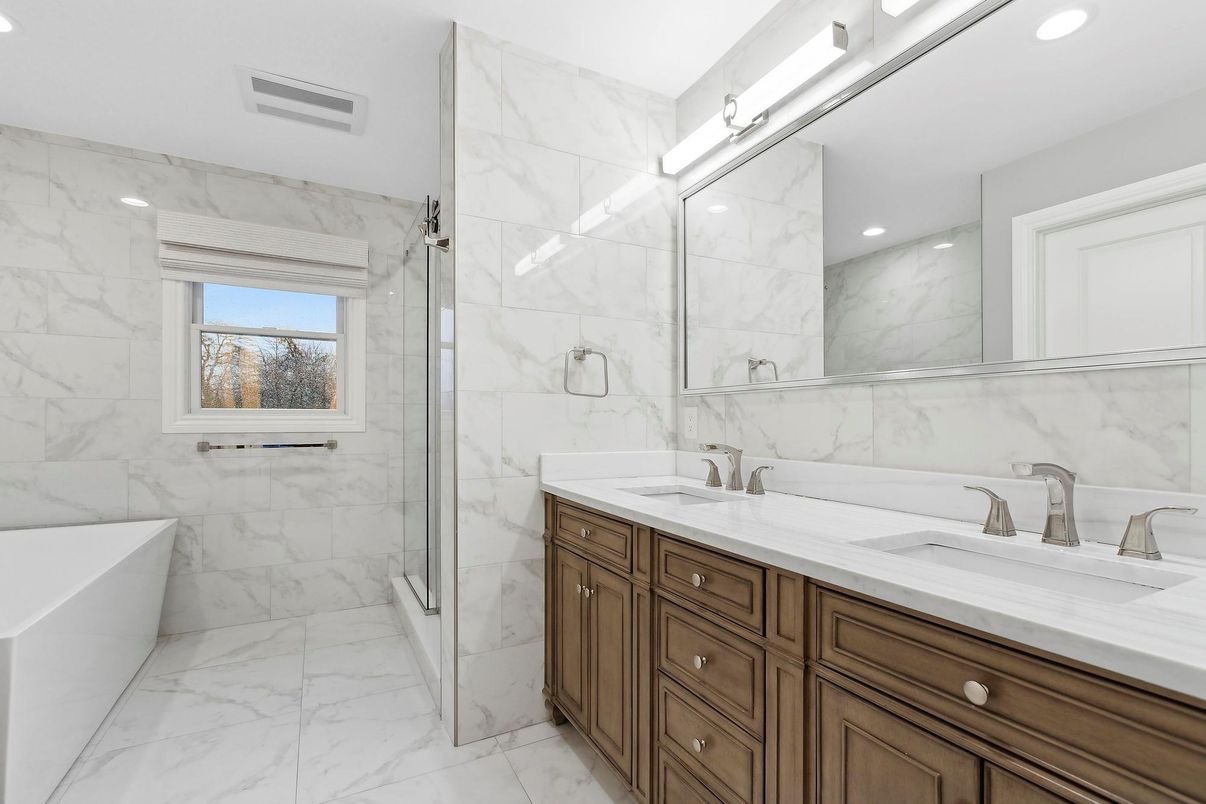 Bathroom, Dual Sink Vanities, Glass Shower, Interior, Marble, Marble Walls, Recessed Lighting