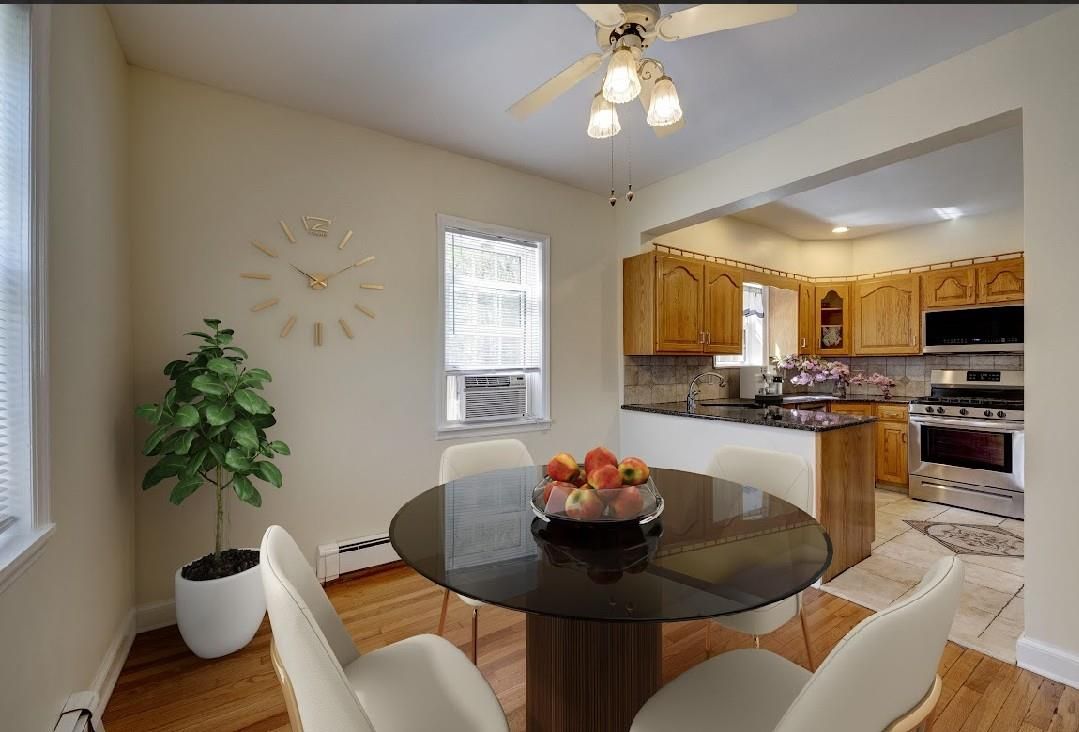 Dining room, Interior, Kitchen, Recessed Lighting, Stainless Steel Appliances, Wood Texture Flooring